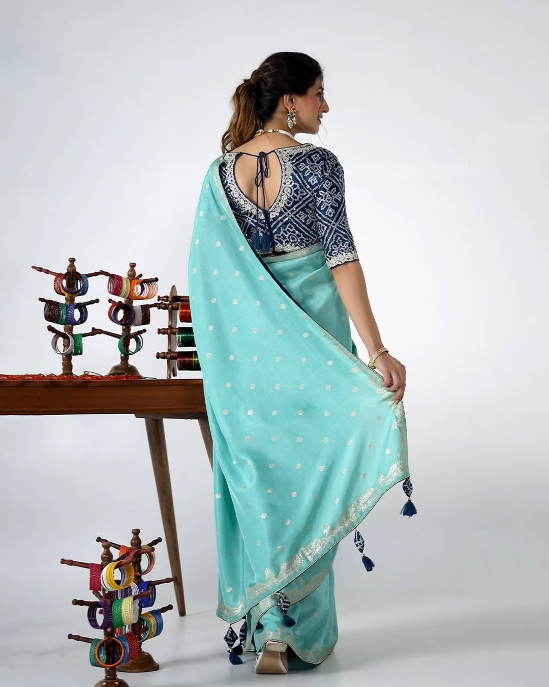 A Nikhaar saree turns moments into rituals and attire into art. Drape yourself in divinity. Vis (1)