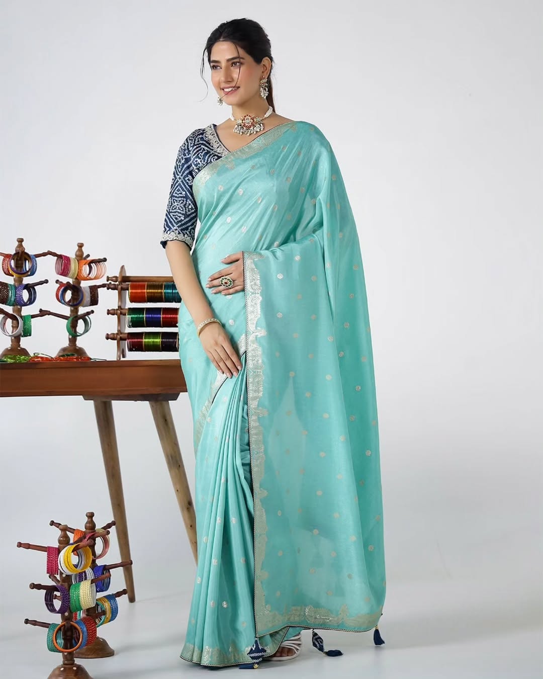 A Nikhaar saree turns moments into rituals and attire into art. Drape yourself in divinity. Vis (2)
