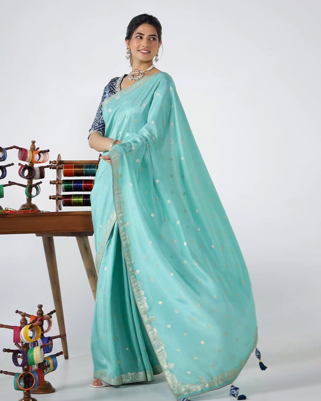 A Nikhaar saree turns moments into rituals and attire into art. Drape yourself in divinity. Vis